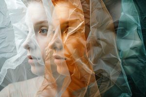 Overlapping translucent layers of different faces representing the fragmented view of customer identity that businesses experience without implementing identity resolution.